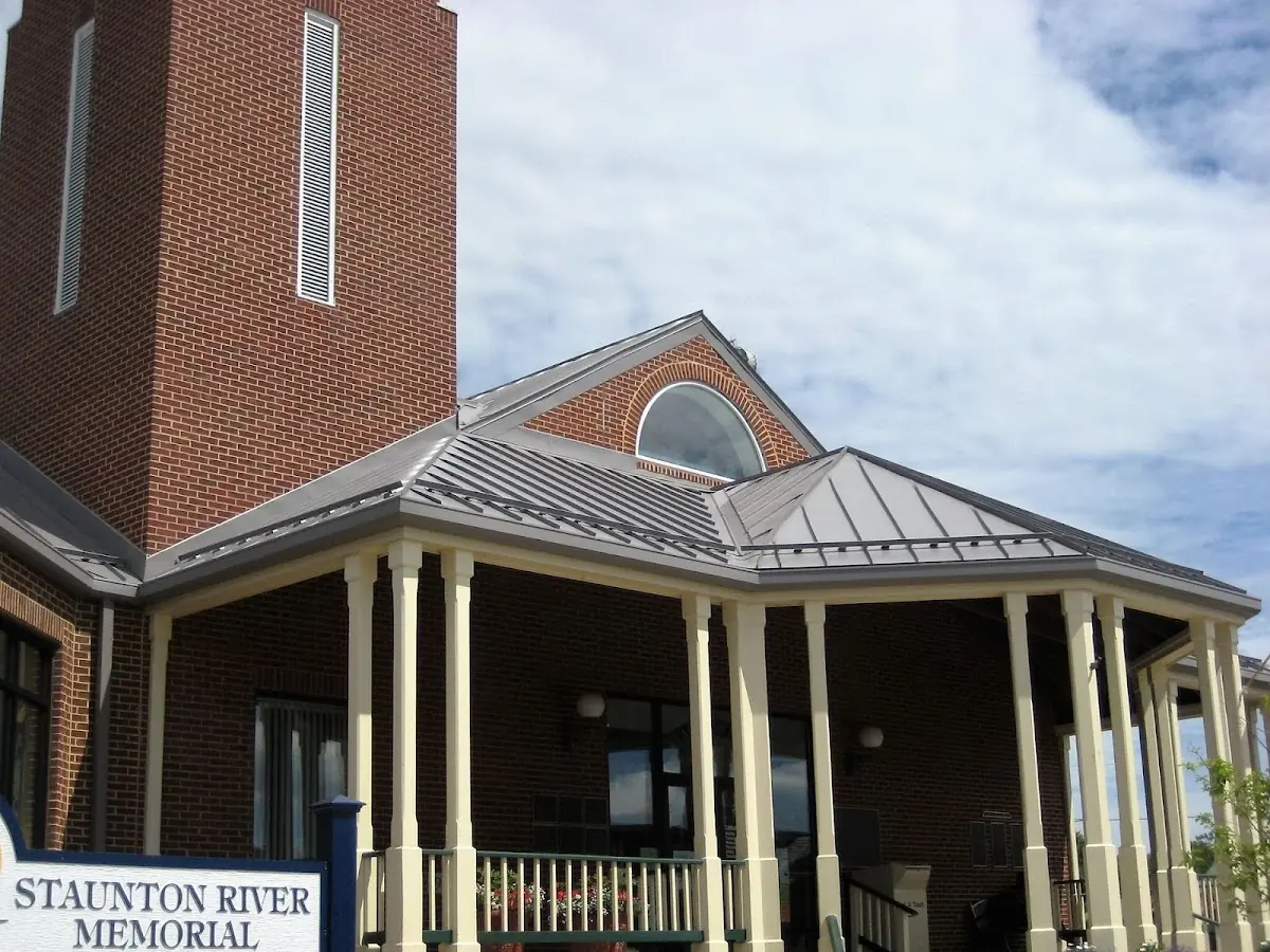 Skilled roofing craftsmen working on a residential roof in Prairie View